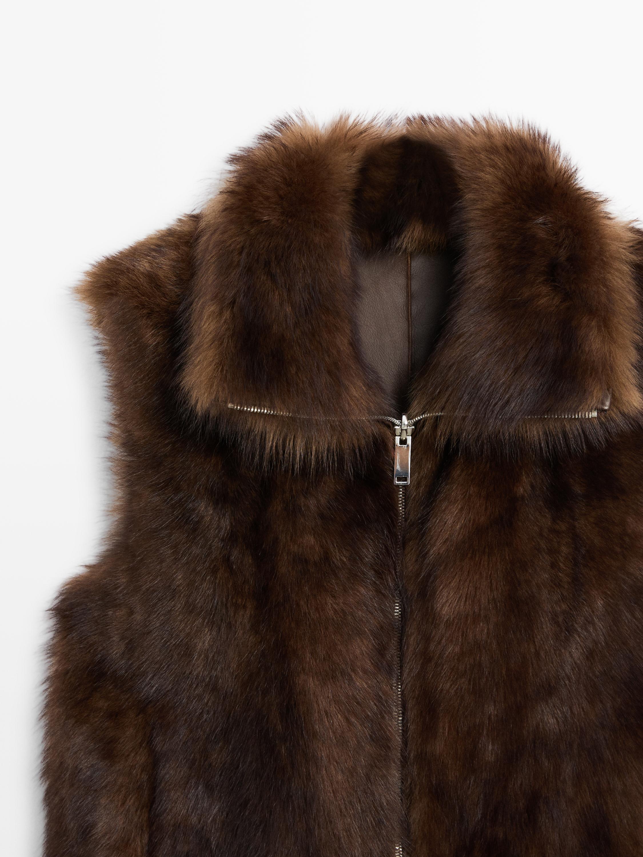 Leather high-neck waistcoat with fur